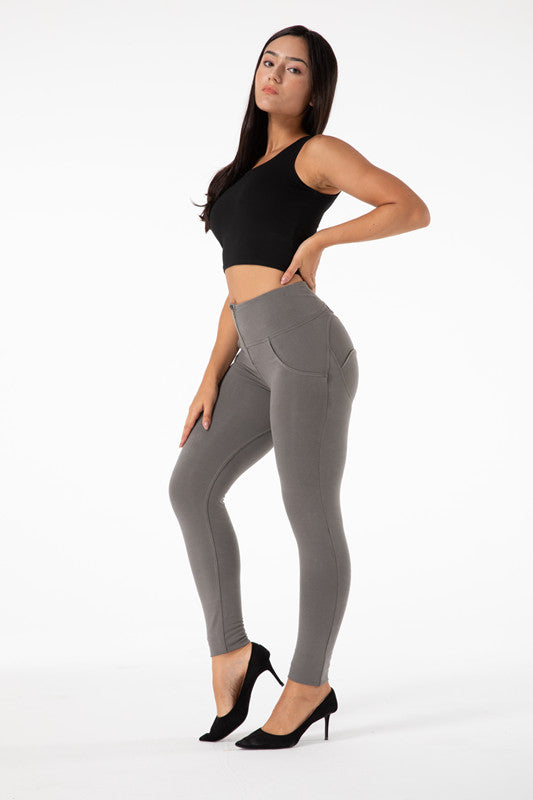 Enge graue Leggings mit hoher Taille