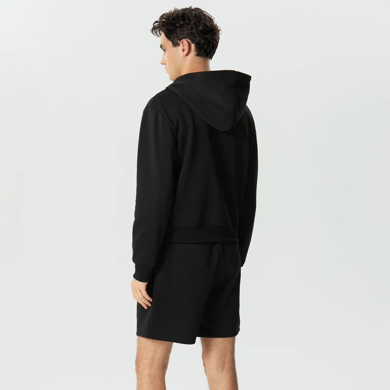 Lässiges Sweatshirt mit Kapuze und langen Ärmeln und Shorts mit Reißverschluss