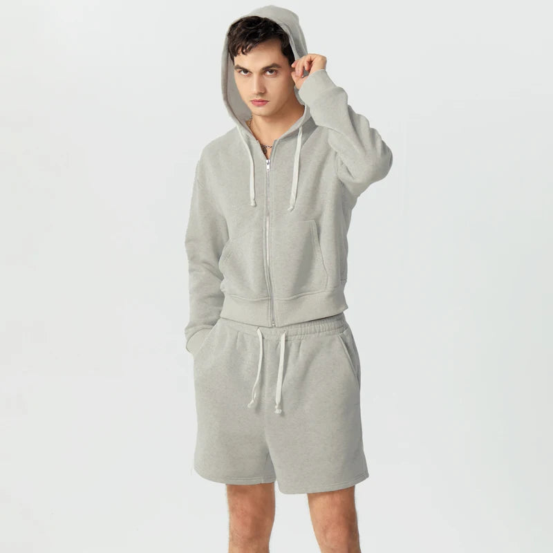 Lässiges Sweatshirt mit Kapuze und langen Ärmeln und Shorts mit Reißverschluss