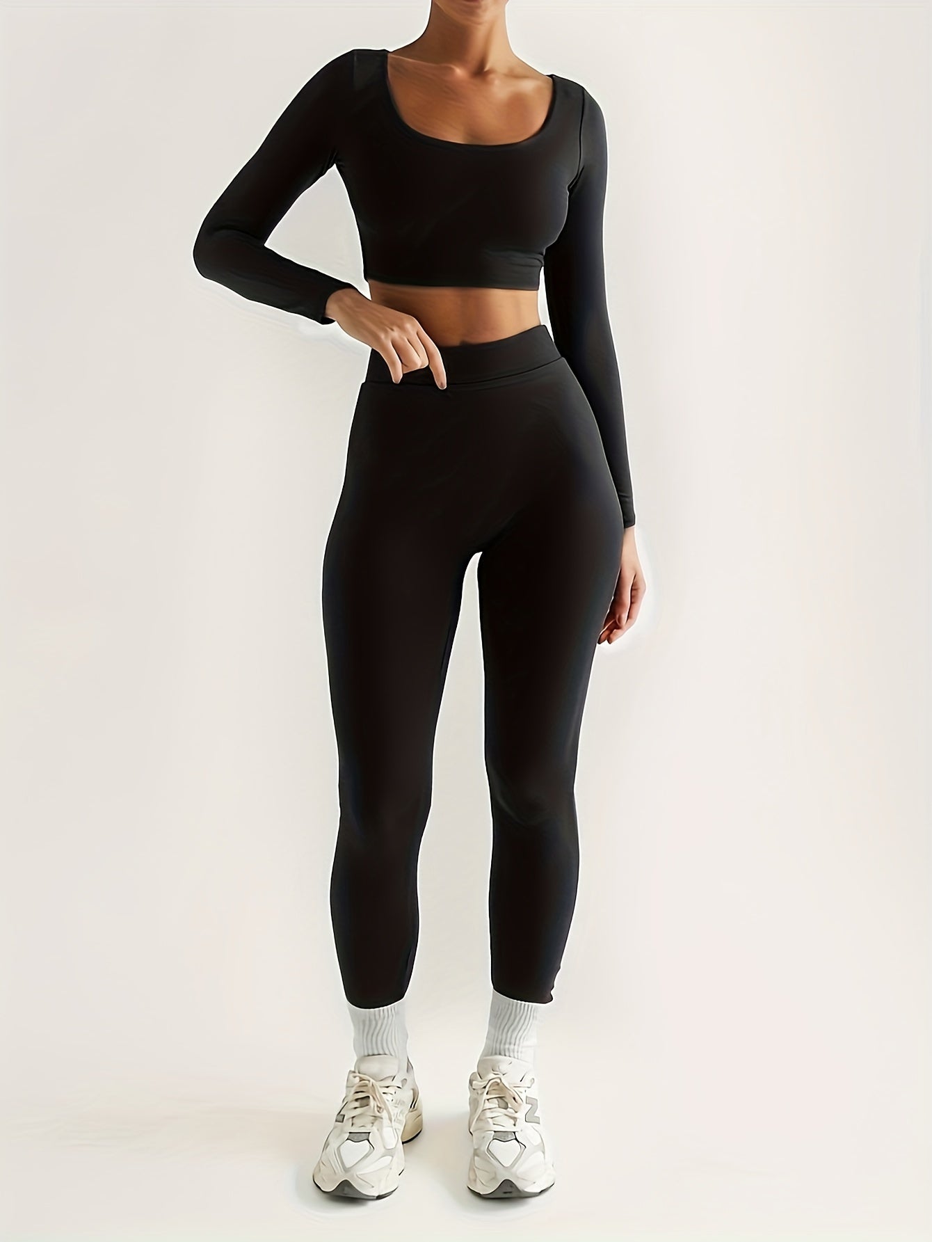 Sport Set aus langärmligem Crop Top und Skinny Hosen mit hoher Taille