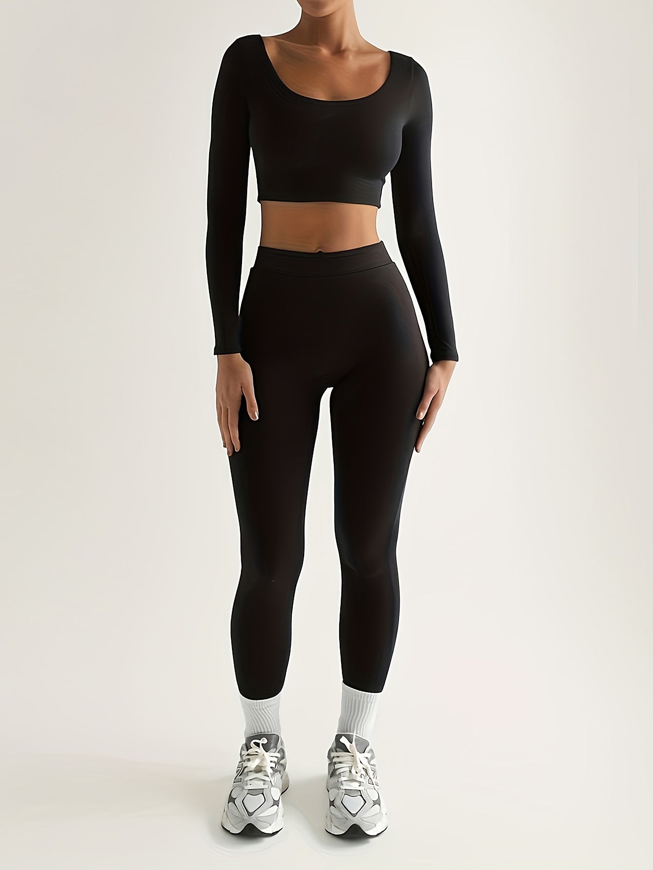 Sport Set aus langärmligem Crop Top und Skinny Hosen mit hoher Taille