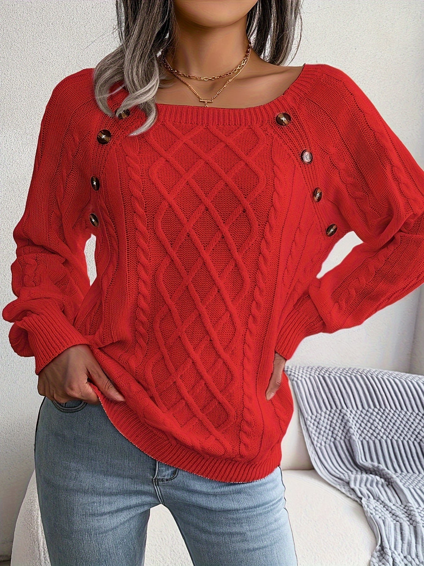 Zopfstrickpullover mit Knopfdesign