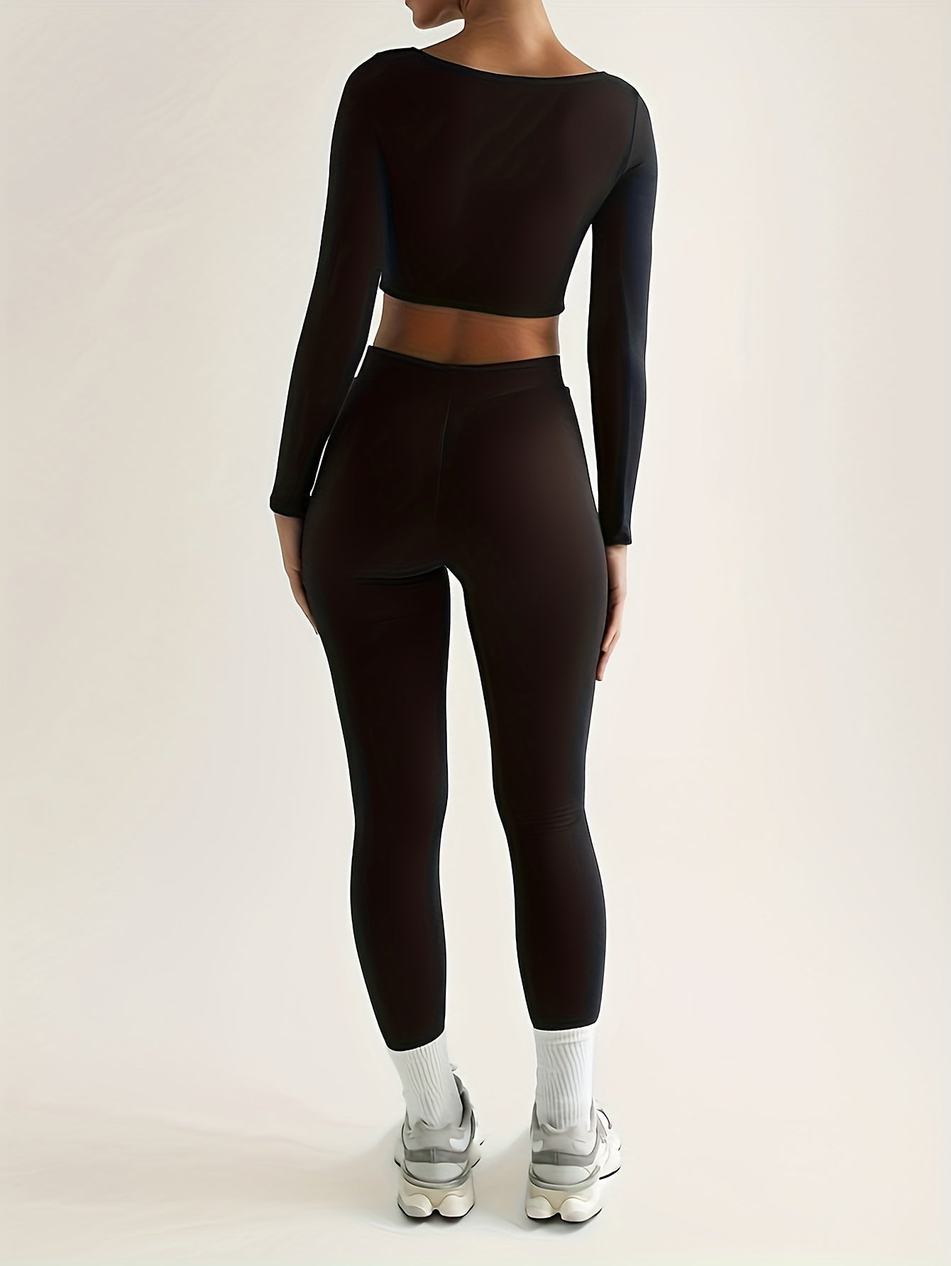 Sport Set aus langärmligem Crop Top und Skinny Hosen mit hoher Taille